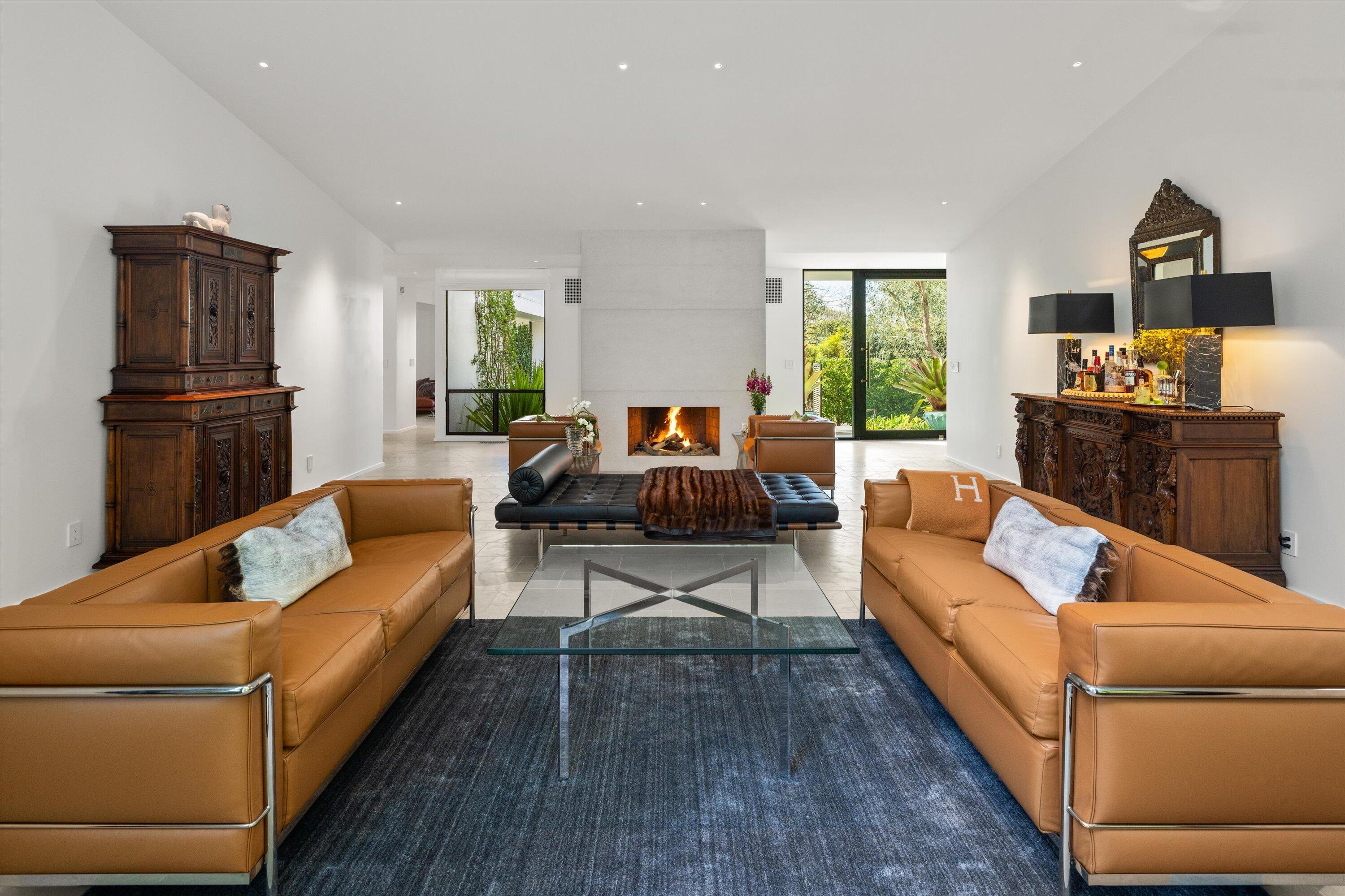 448 Court Place Montecito, CA 93108 - Photo 7 of 33 a living room with furniture and a flat screen tv