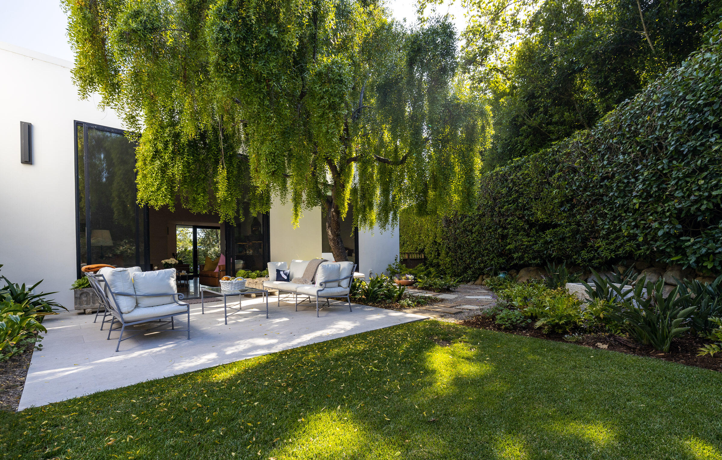 448 Court Place Montecito, CA 93108 - Photo 10 of 33 a backyard of a house with seating space