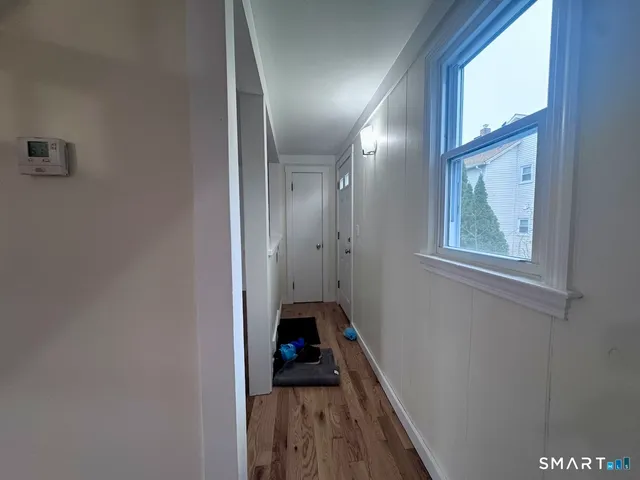 a view of a hallway with workspace