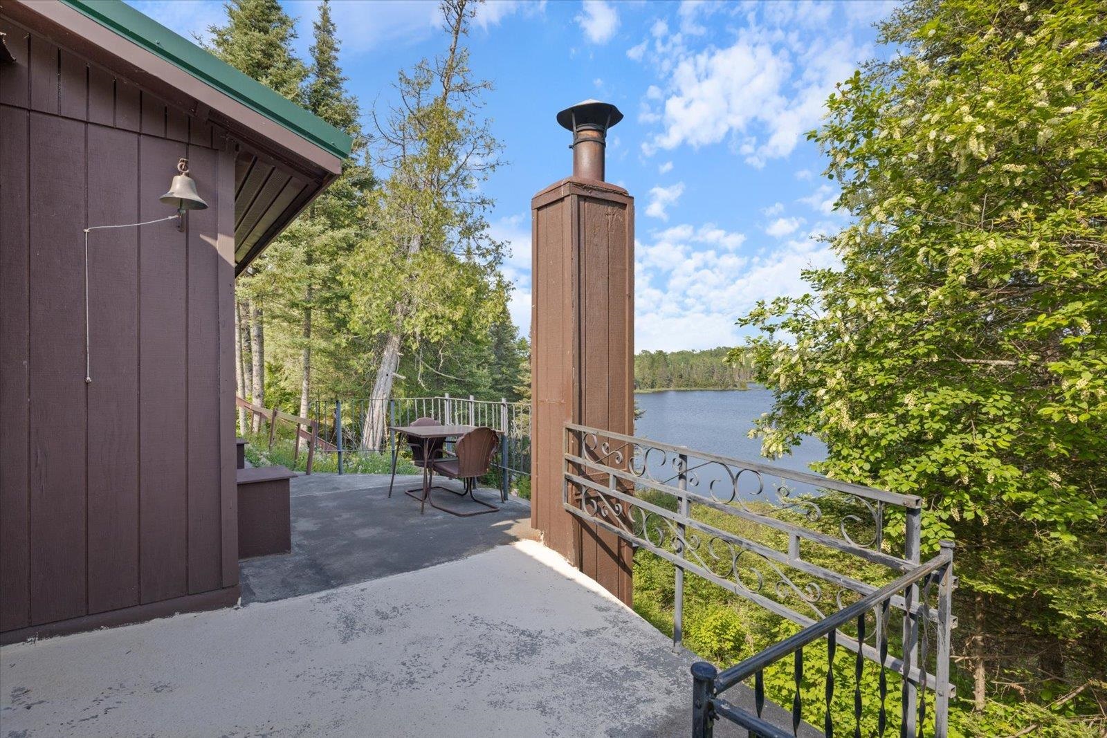9420 Vollmer Drive Isabella, MN 55607 - Photo 14 of 37 View of patio featuring a water view