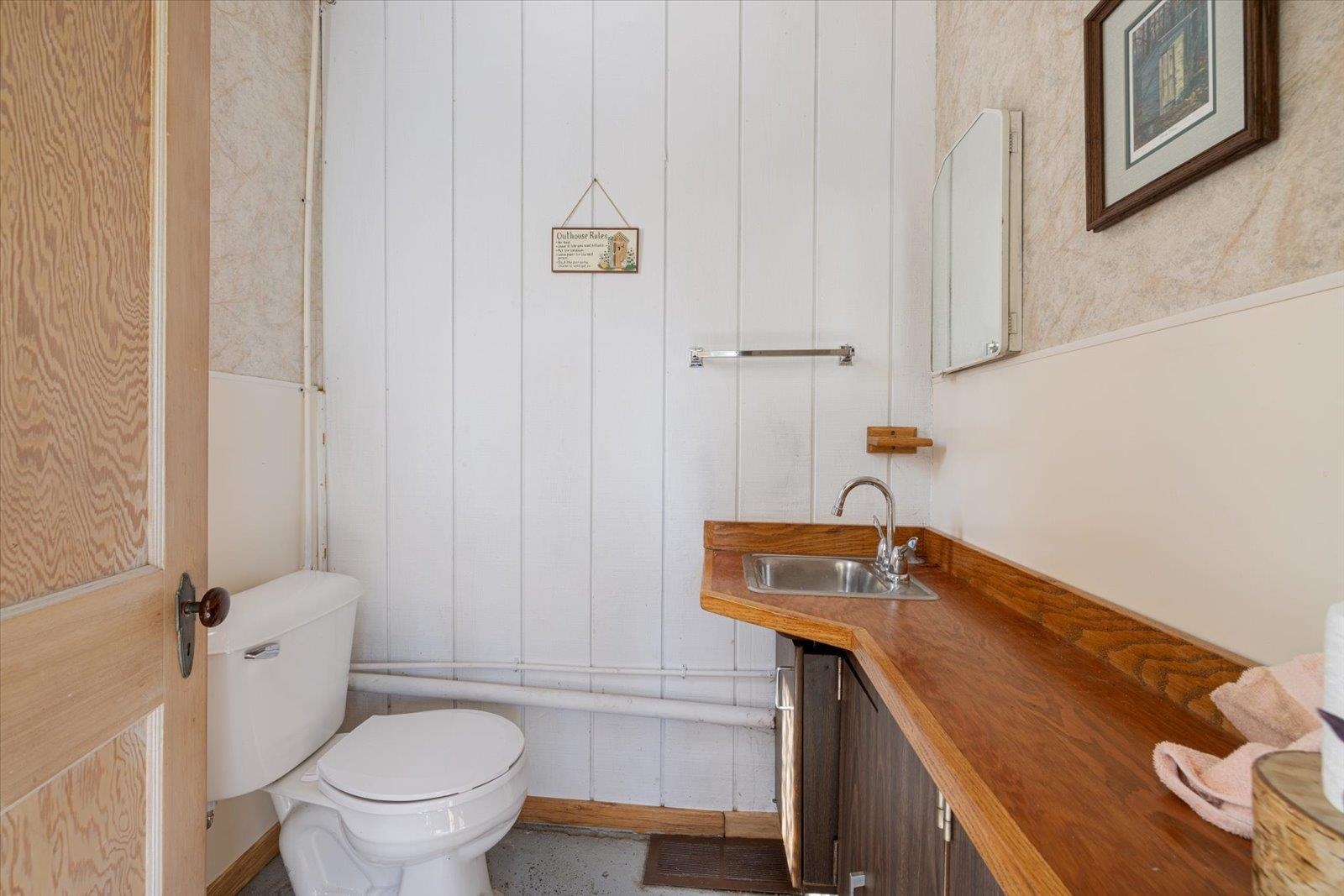 9420 Vollmer Drive Isabella, MN 55607 - Photo 29 of 37 Bathroom featuring toilet and vanity