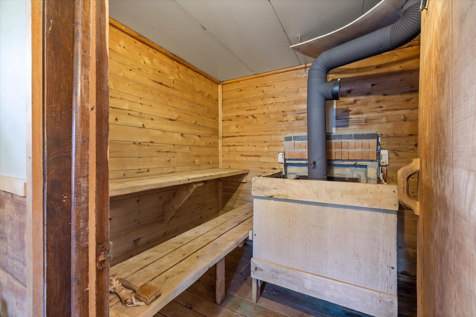 9420 Vollmer Drive Isabella, MN 55607 - Photo 31 of 37 Relaxing sauna / steam room with wood walls and wood finished floors