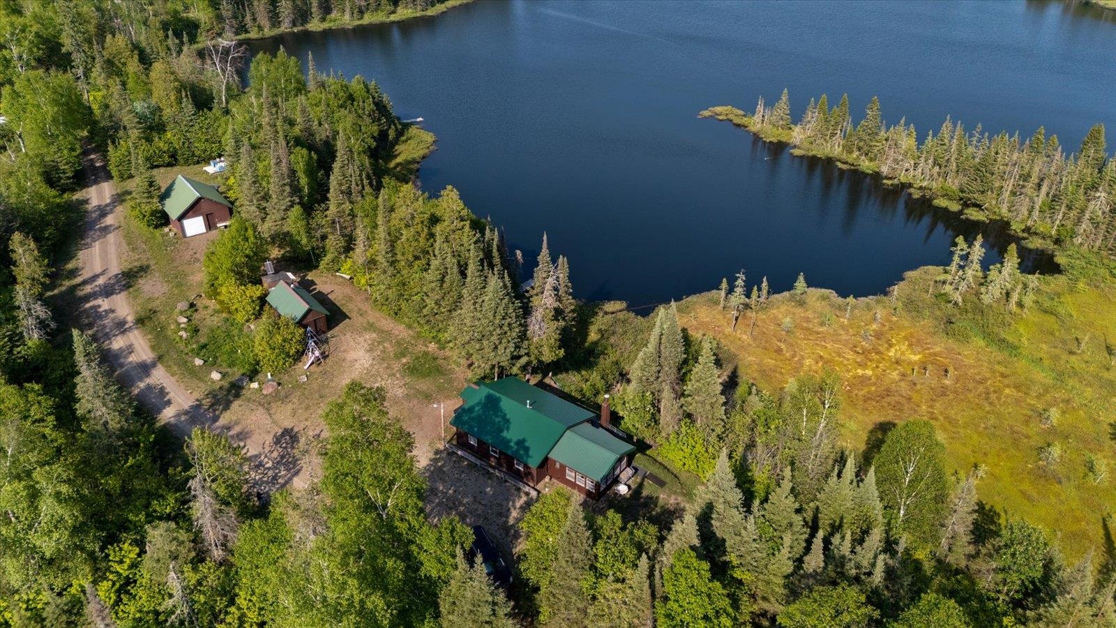 9420 Vollmer Drive Isabella, MN 55607 - Photo 8 of 37 Bird's eye view of a large body of water and a forest