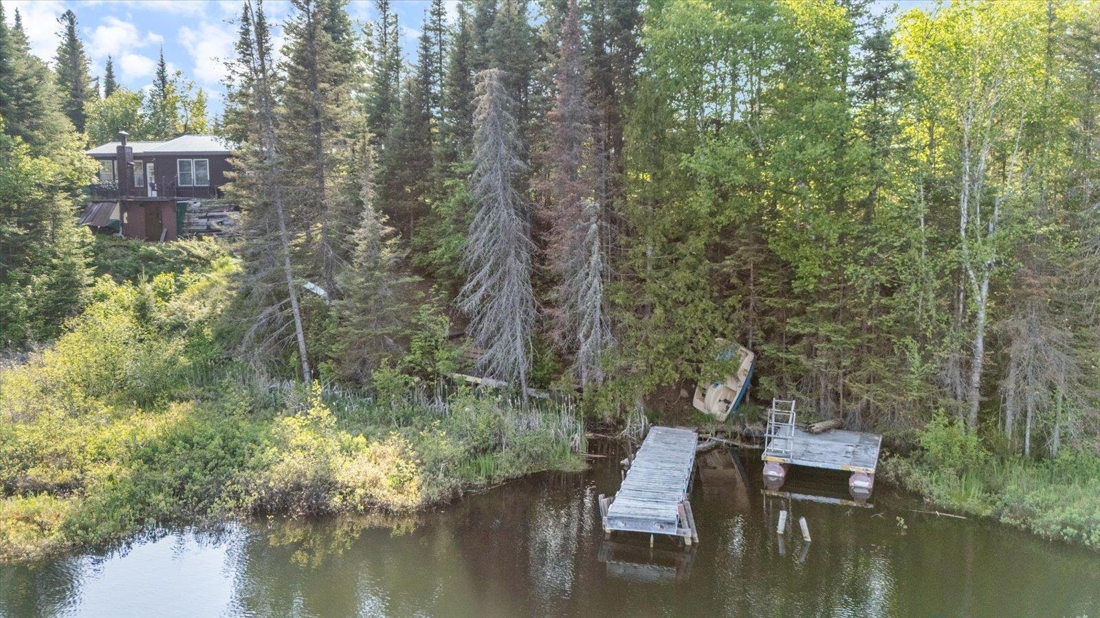 9420 Vollmer Drive Isabella, MN 55607 - Photo 10 of 37 Dock featuring a water view and a wooded view