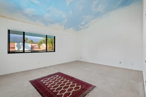 an entryway with an empty room