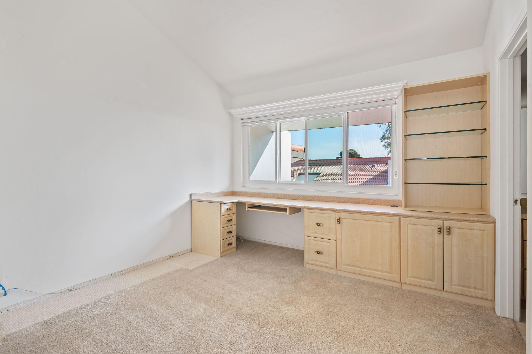 659 Del Parque Drive, Unit E Santa Barbara, CA 93103 - Photo 19 of 32 a room with a white cabinets