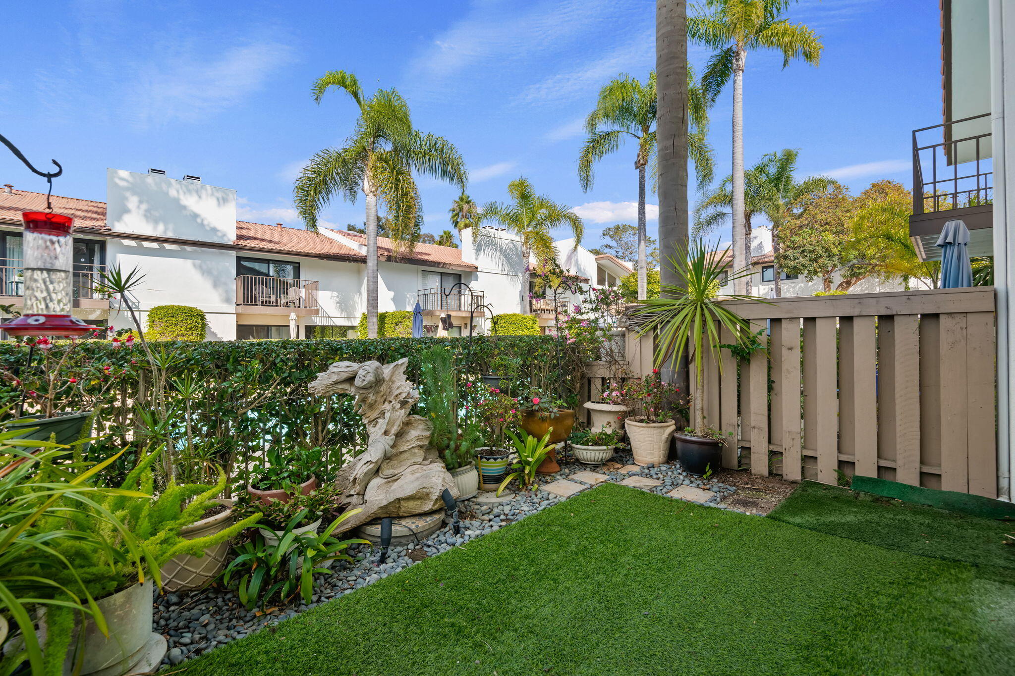 659 Del Parque Drive, Unit E Santa Barbara, CA 93103 - Photo 2 of 32 a front view of a house with a garden