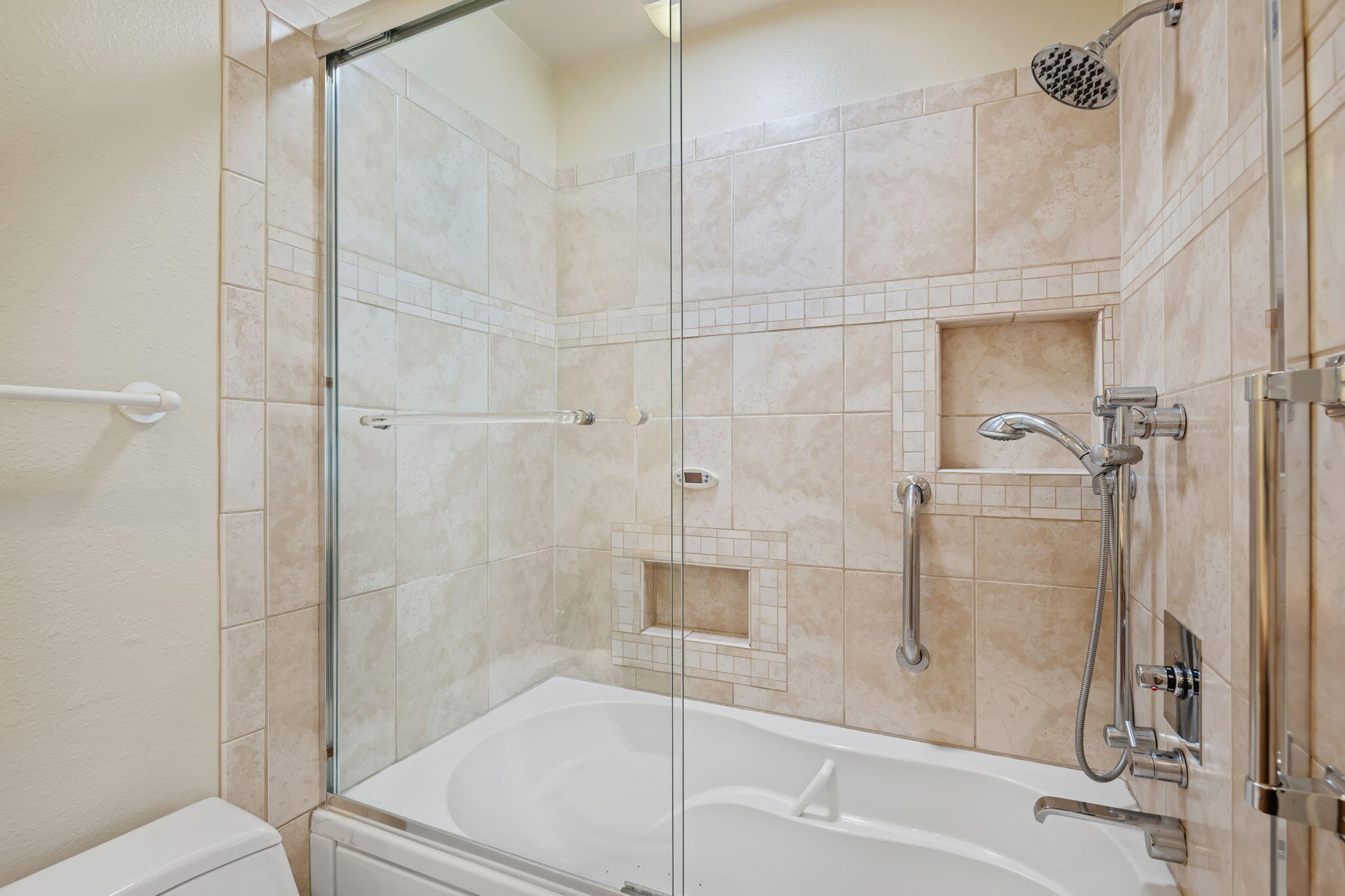 659 Del Parque Drive, Unit E Santa Barbara, CA 93103 - Photo 22 of 32 a bathroom with a bathtub and a shower