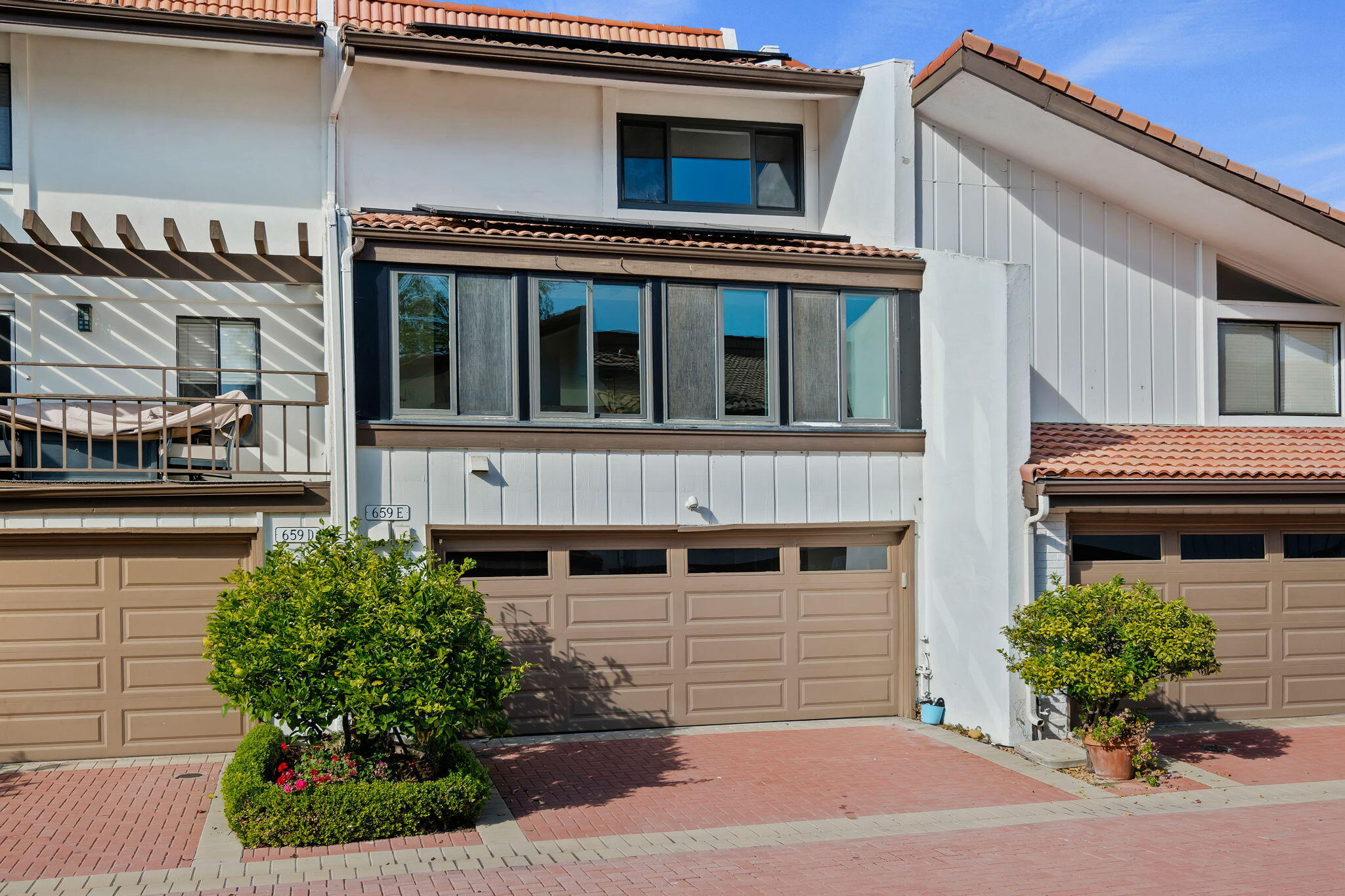 659 Del Parque Drive, Unit E Santa Barbara, CA 93103 - Photo 23 of 32 a view of a house with a window and potted plants