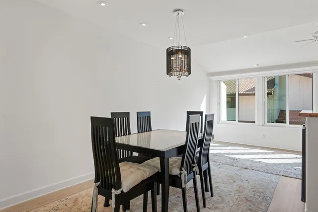 a kitchen with a stove and a refrigerator