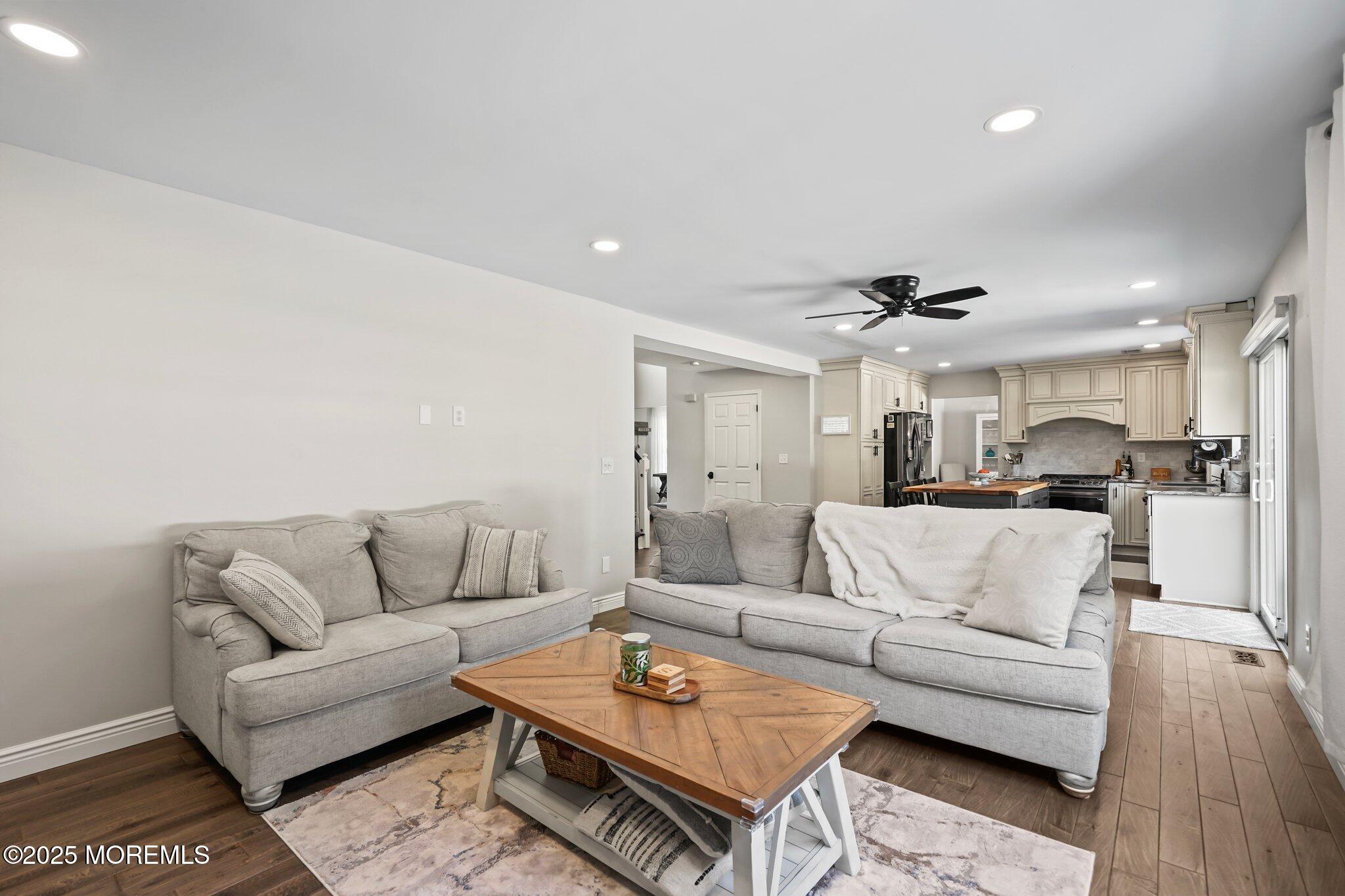 24 Mount Ranier Drive Howell, NJ 07731 - Photo 18 of 53 a living room with furniture and a table