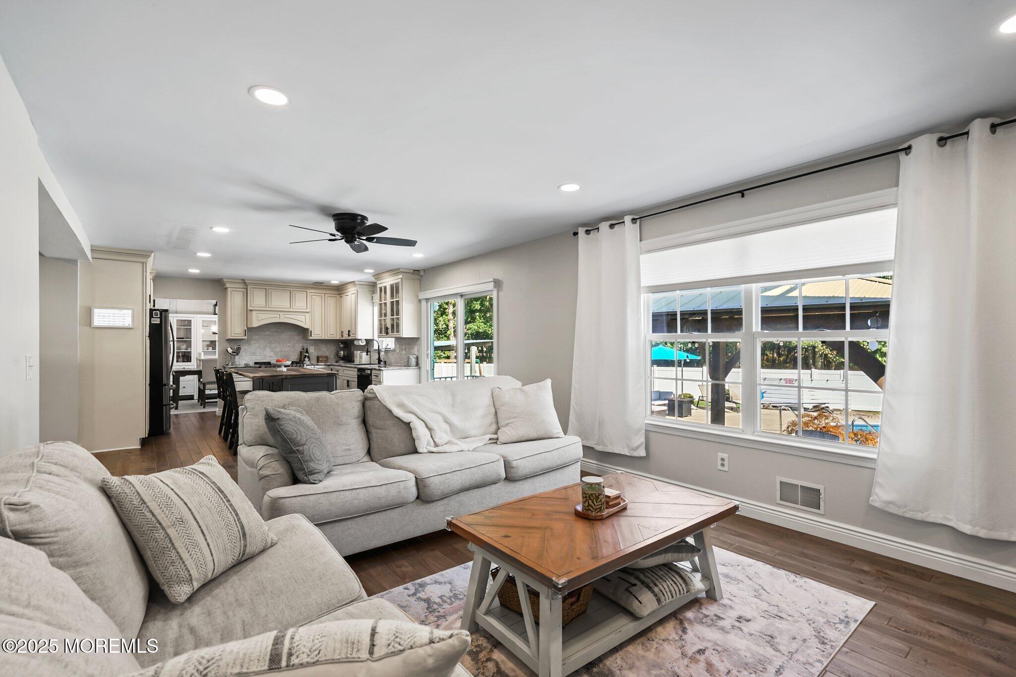 24 Mount Ranier Drive Howell, NJ 07731 - Photo 19 of 53 a living room with furniture and a window