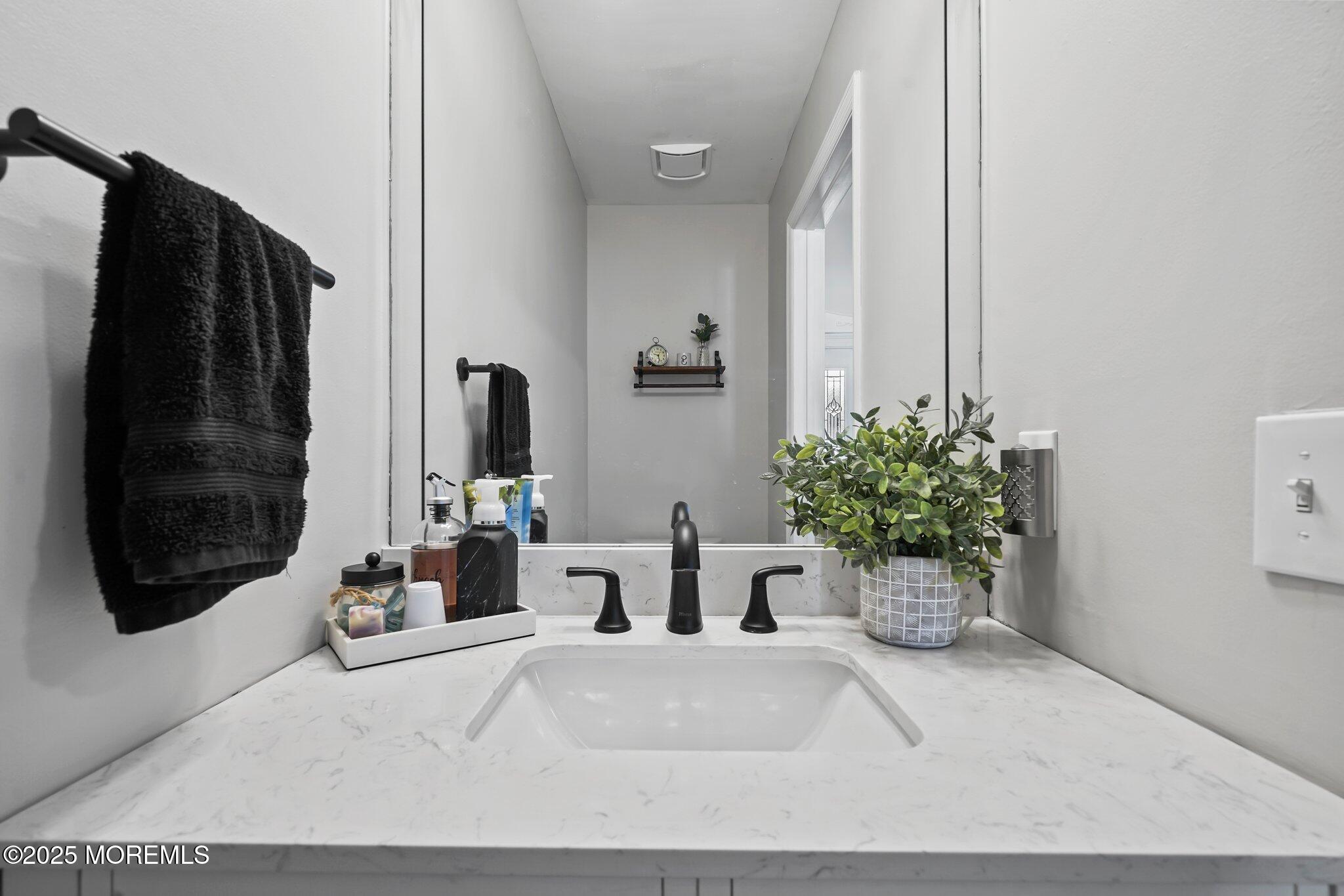 24 Mount Ranier Drive Howell, NJ 07731 - Photo 21 of 53 a view of a living room and bathroom