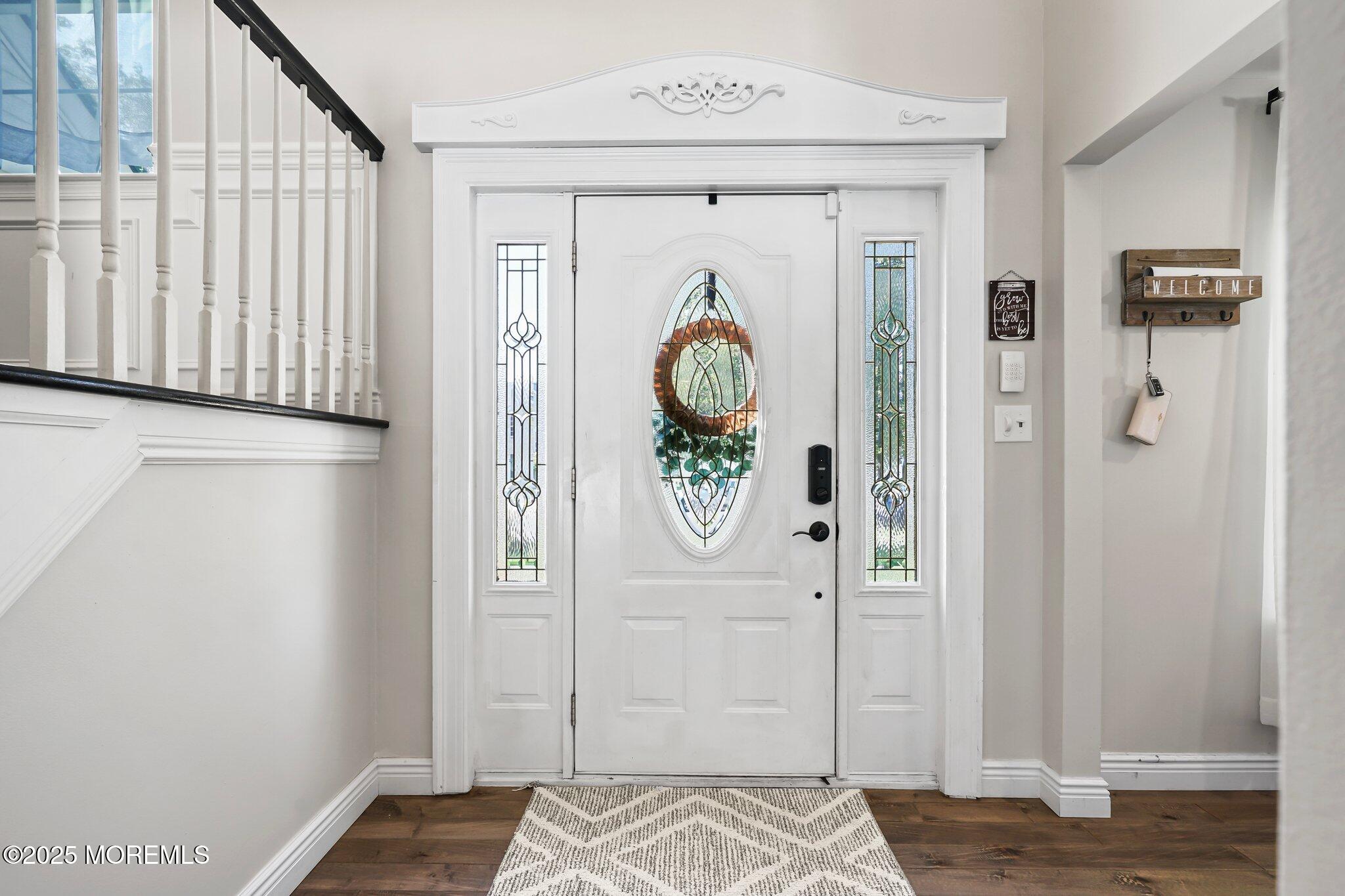 24 Mount Ranier Drive Howell, NJ 07731 - Photo 22 of 53 a view of a bedroom with wooden floor and hallway