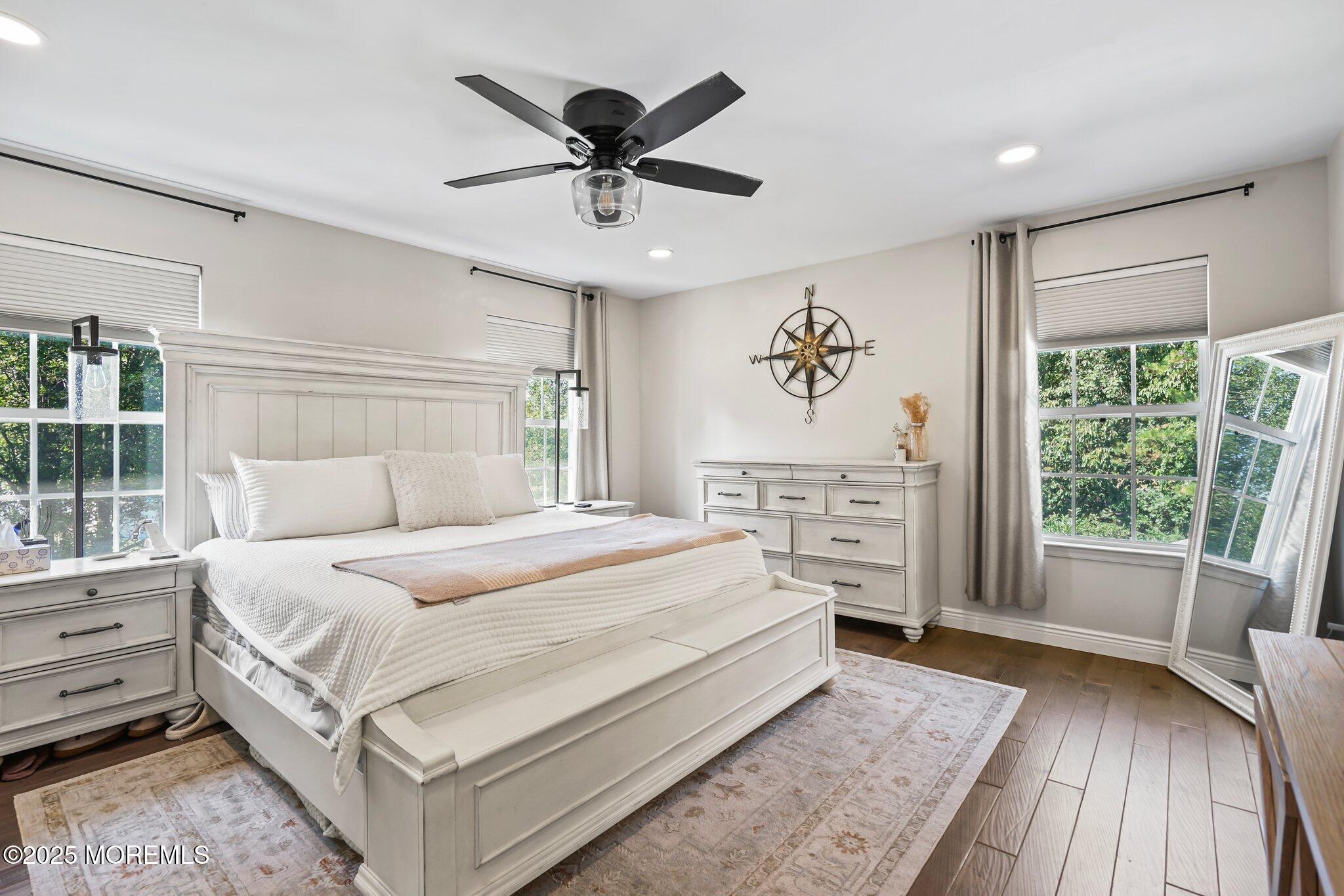 24 Mount Ranier Drive Howell, NJ 07731 - Photo 28 of 53 a bedroom with a large bed and a window