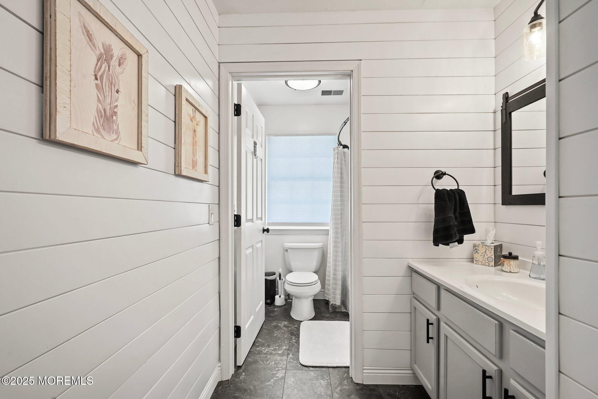 24 Mount Ranier Drive Howell, NJ 07731 - Photo 33 of 53 a bathroom with a sink toilet and shower