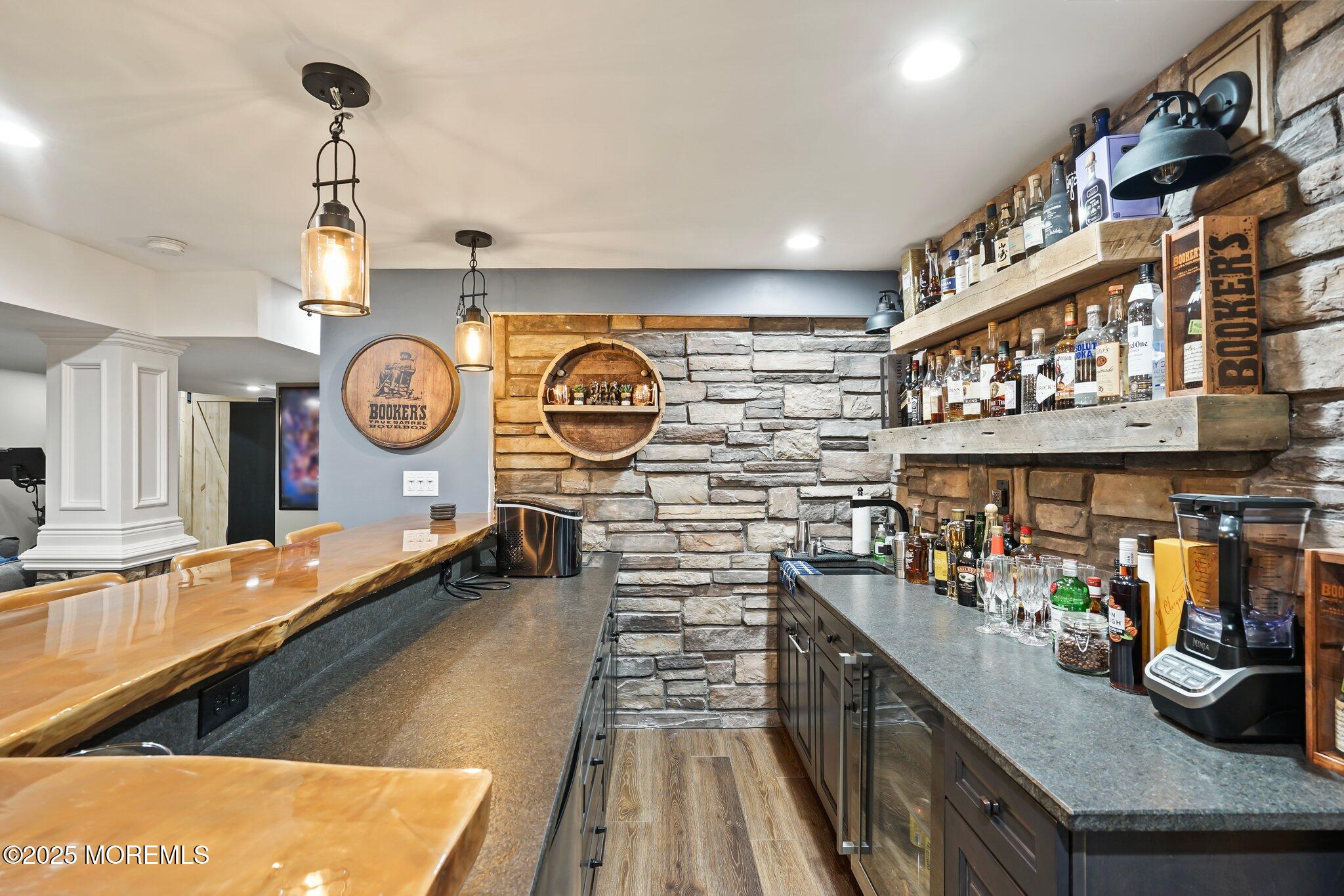 24 Mount Ranier Drive Howell, NJ 07731 - Photo 38 of 53 a kitchen with lots of counter top space and stainless steel appliances
