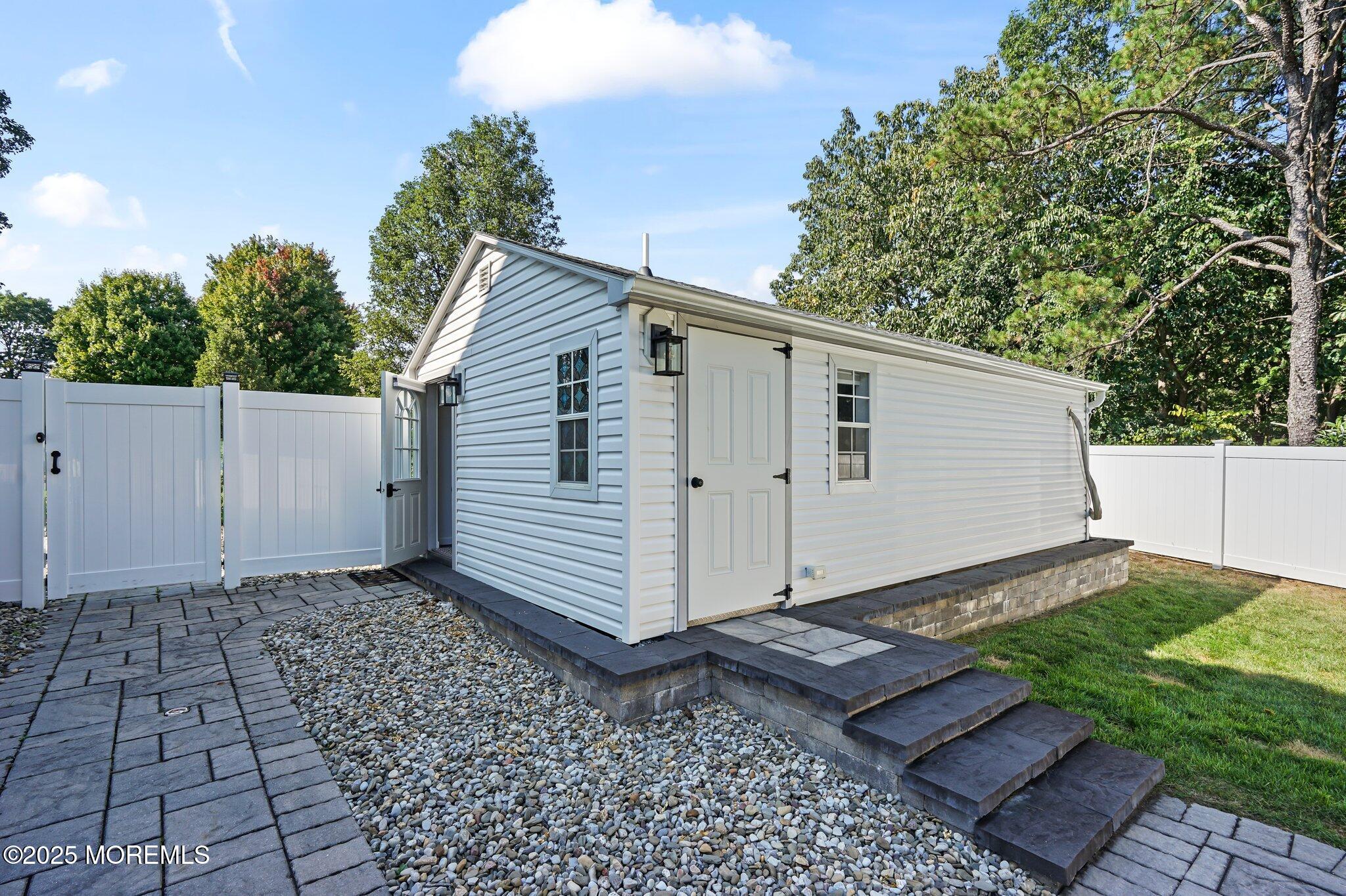 24 Mount Ranier Drive Howell, NJ 07731 - Photo 48 of 53 a view of a back yard of the house