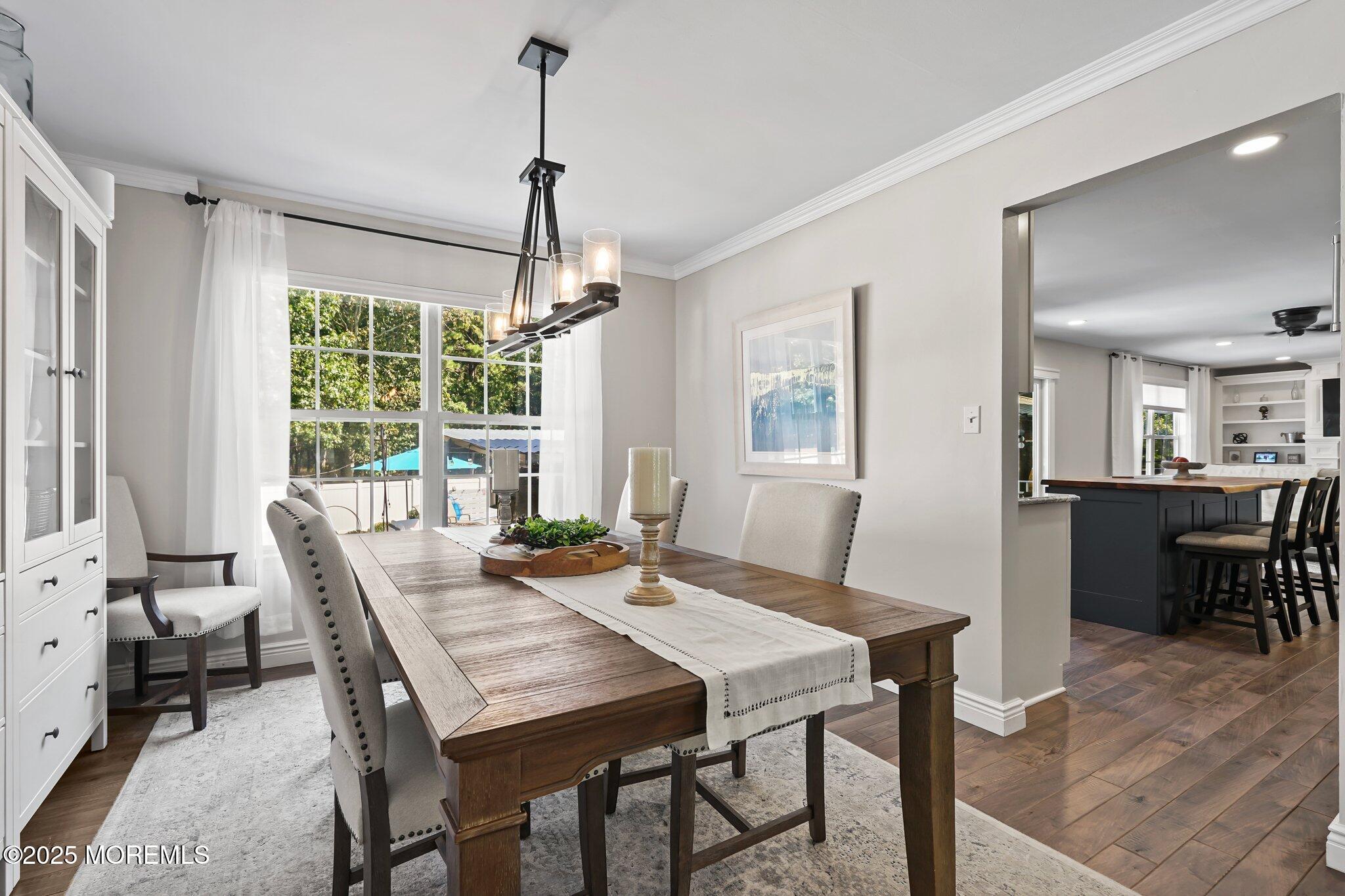 24 Mount Ranier Drive Howell, NJ 07731 - Photo 10 of 53 a view of a dining room with furniture window and outside view