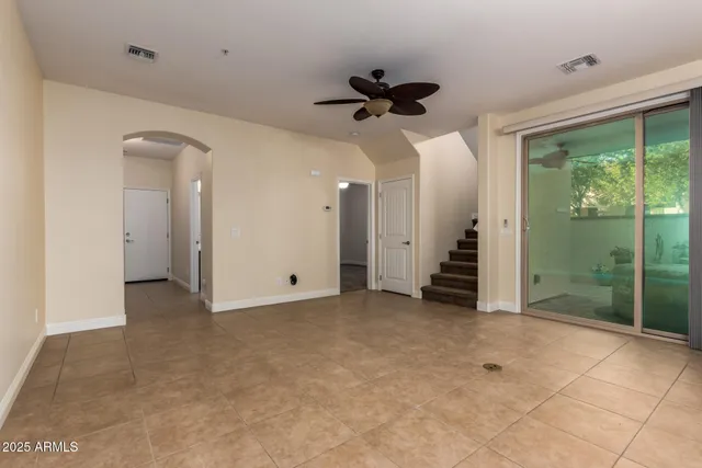 a view of a big room with windows