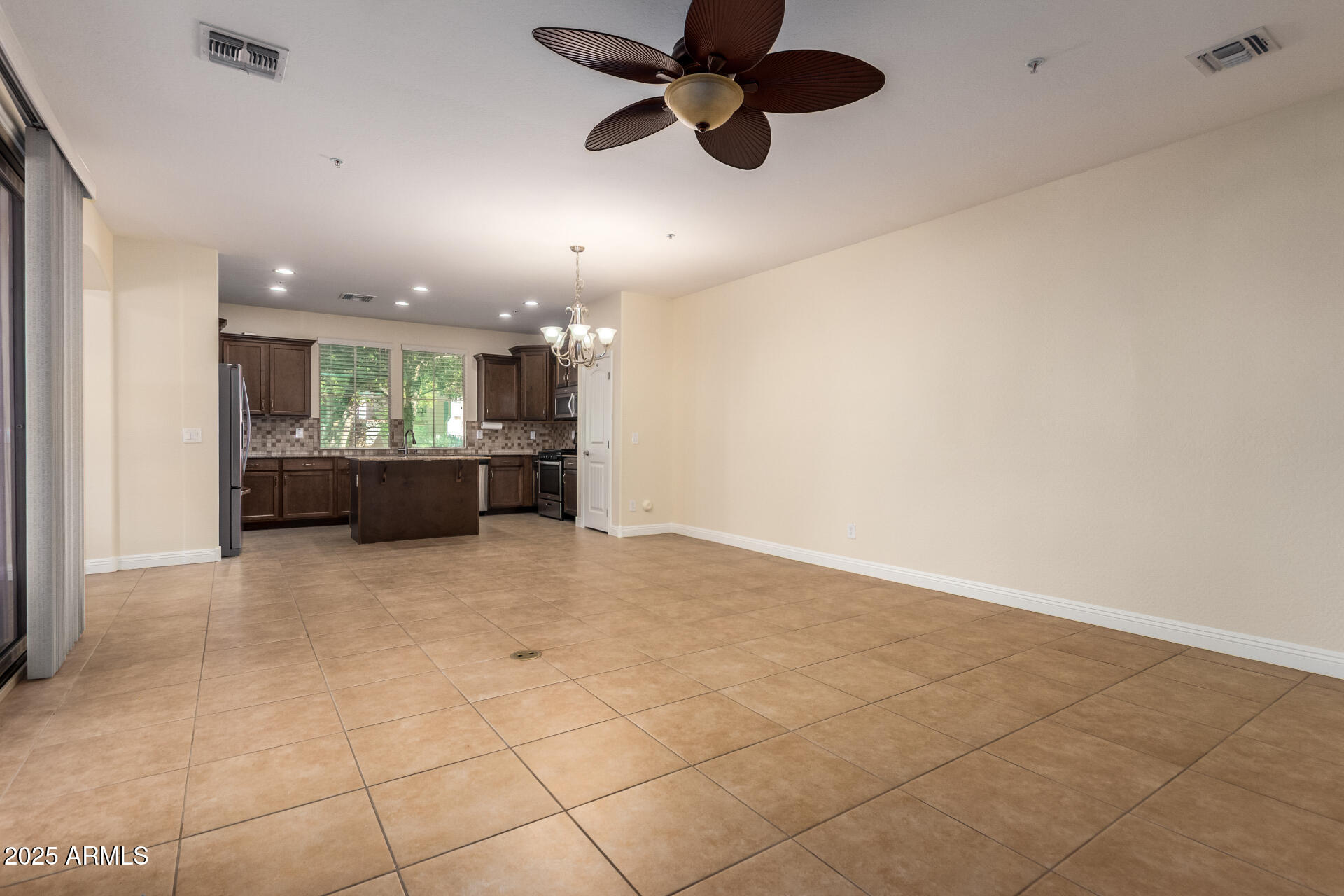20977 West Hamilton Street Buckeye, AZ 85396 - Photo 5 of 53 Great room and kitchen