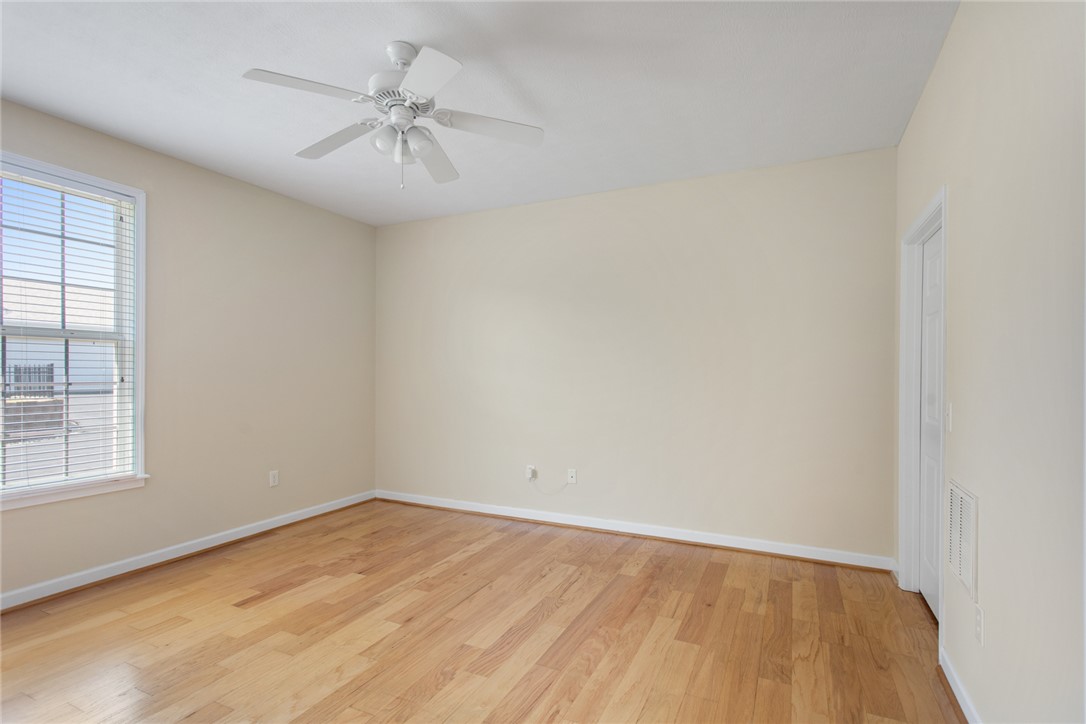 155 Life Style Lane Anderson, SC 29621 - Photo 18 of 49 This spacious room features ample natural light and beautiful hardwood flooring.