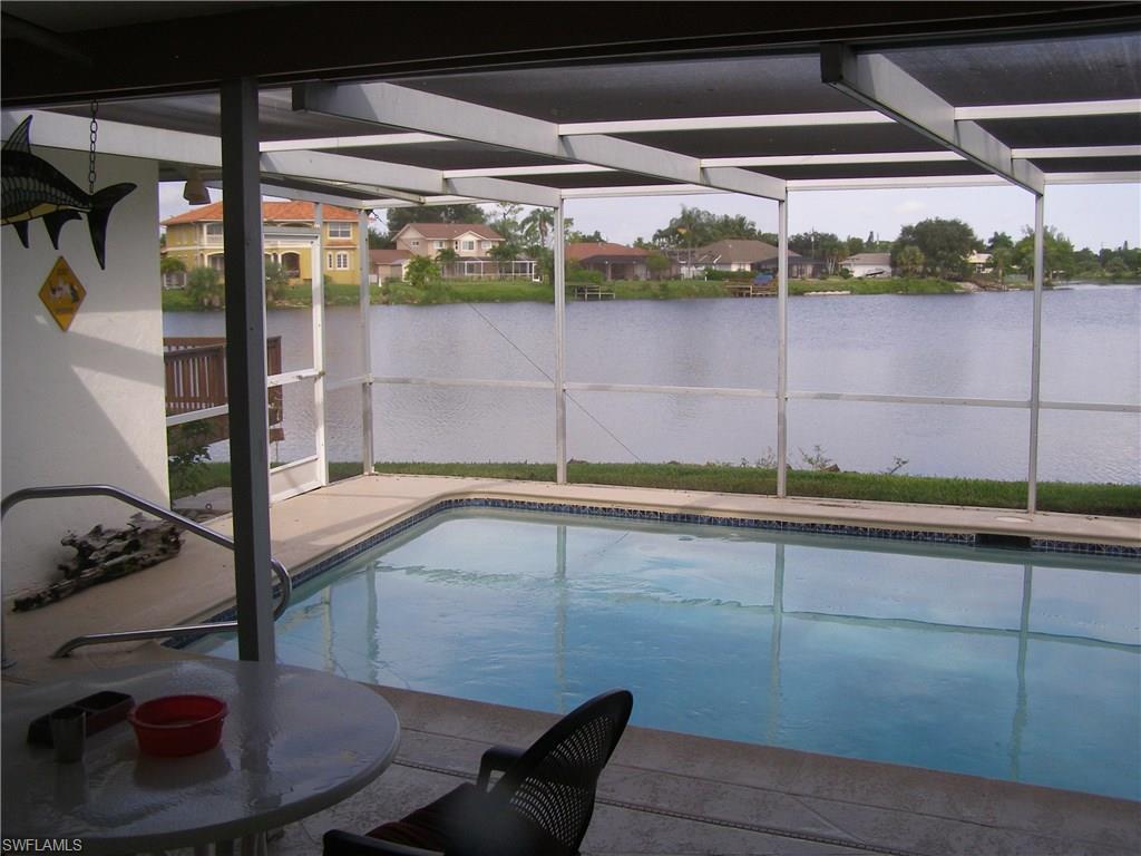 3065 50th Lane Southwest Naples, FL 34116 - Photo 15 of 25 a room with water heater and a wooden floors