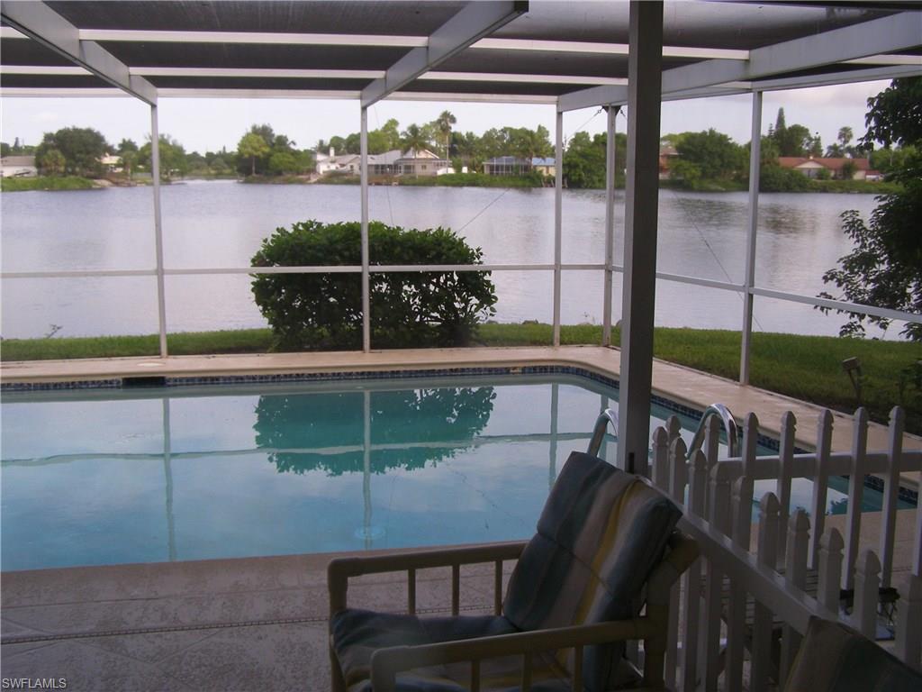 3065 50th Lane Southwest Naples, FL 34116 - Photo 18 of 25 a view of a chairs and table in the balcony
