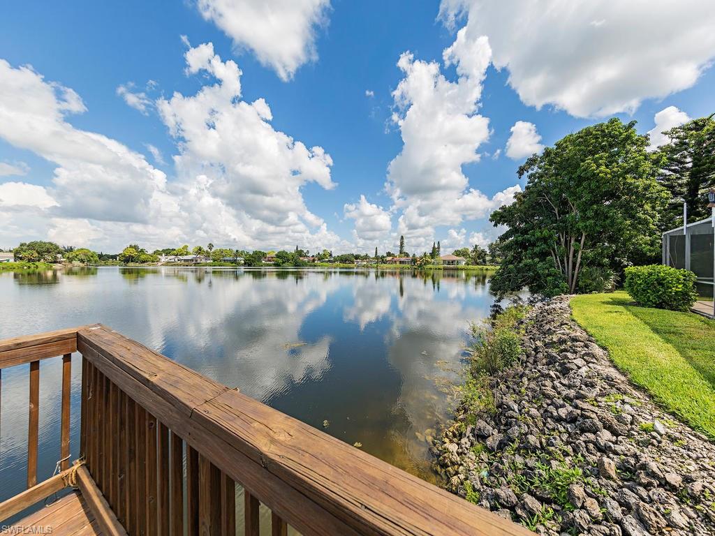 3065 50th Lane Southwest Naples, FL 34116 - Photo 7 of 25 a view of a lake from a balcony