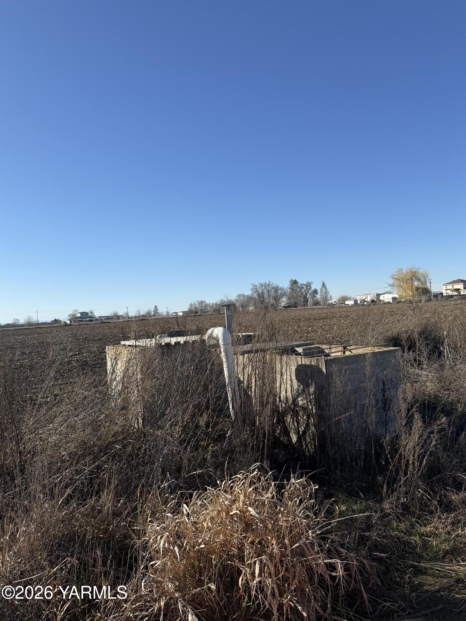 168505 West King Tull Road Prosser, WA 99350 - Photo 9 of 25 a view of a lake with mountains in the background