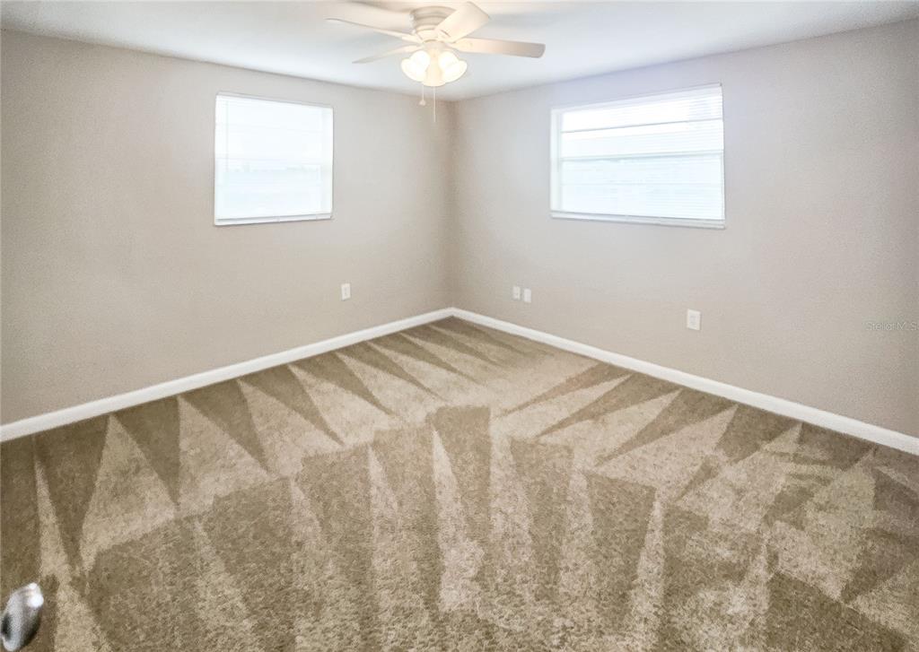 7304 Embassy Boulevard Port Richey, FL 34668 - Photo 11 of 14 a view of a room with a window