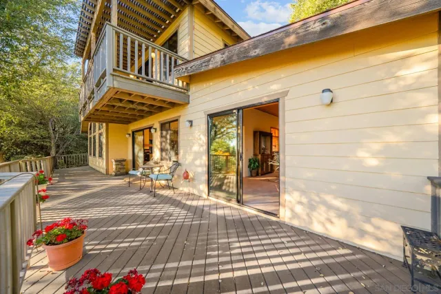 a view of a building with sitting area