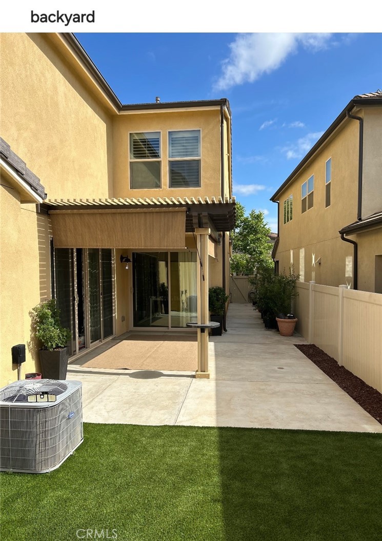21574 Trail Ridge Drive Escondido, CA 92029 - Photo 4 of 36 Backyard with Artificial Turf and Trellis Patio and Manual Crank Shade