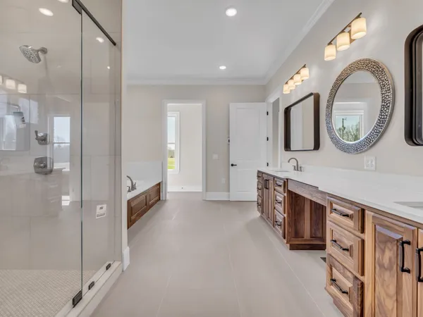 a bathroom with a glass shower door