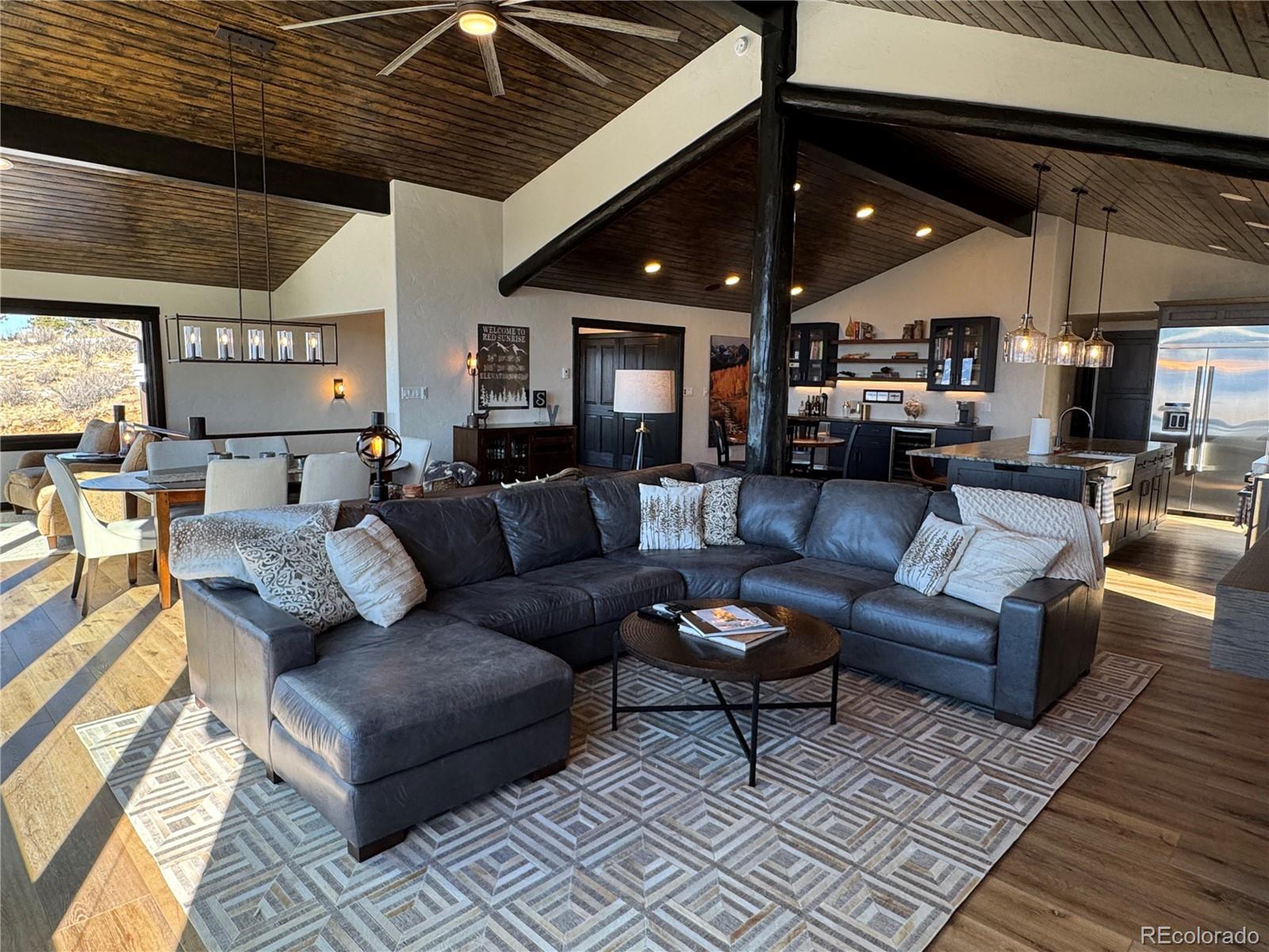 680 Ridge Road Westcliffe, CO 81252 - Photo 18 of 46 a living room with furniture and a wooden floor