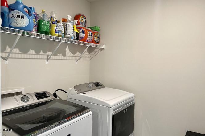 1807 Wrenn Road Durham, NC 27703 - Photo 30 of 43 a utility room with dryer and washer