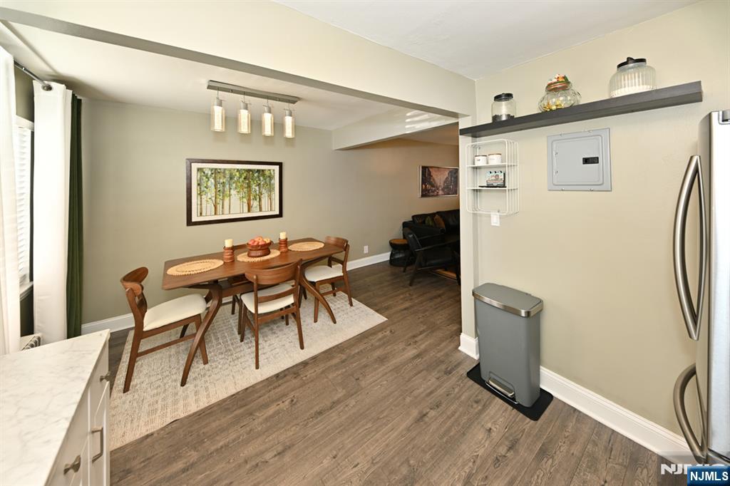 483 Colonial Terrace, Unit 9 Hackensack, NJ 07601 - Photo 11 of 25 a view of a dining room with furniture and wooden floor