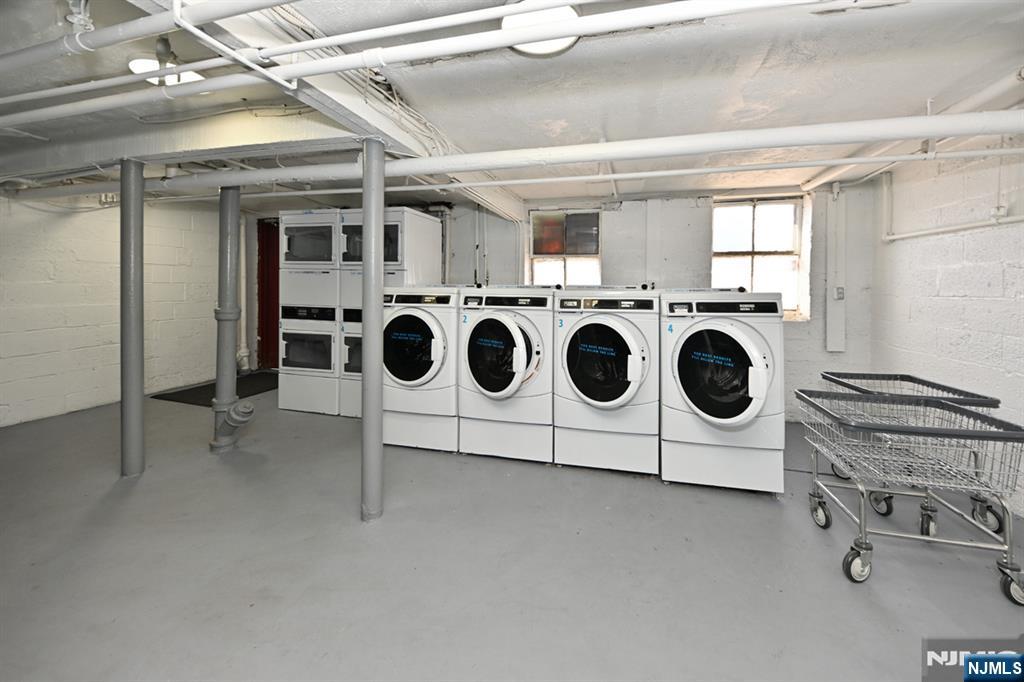 483 Colonial Terrace, Unit 9 Hackensack, NJ 07601 - Photo 19 of 25 a utility room with dryer and washer