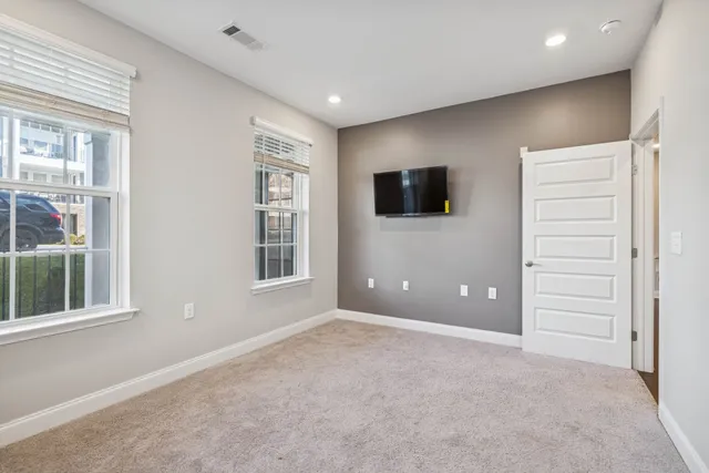 a view of a livingroom with a flat screen tv