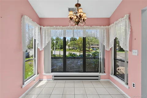 $599,000 | 91 Hidden Ponds Circle, Smithtown, NY 11787
