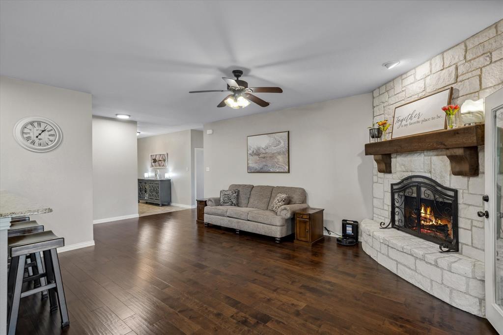 16159 County Road 347 Wills Point, TX 75169 - Photo 11 of 38 a living room with furniture and a fireplace