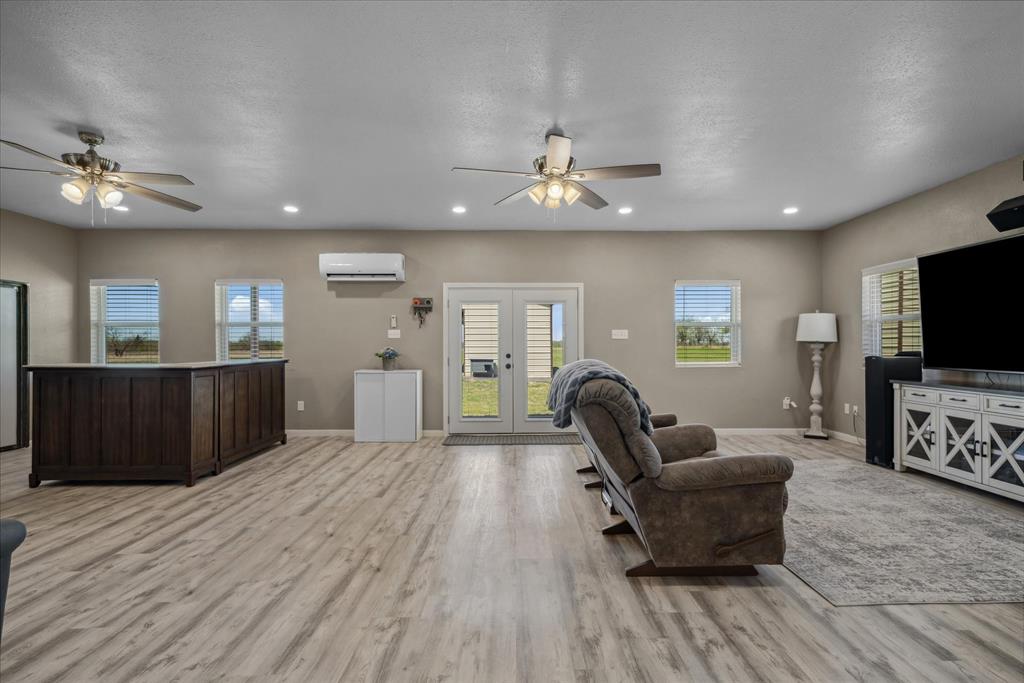 16159 County Road 347 Wills Point, TX 75169 - Photo 12 of 38 a living room with furniture and a flat screen tv