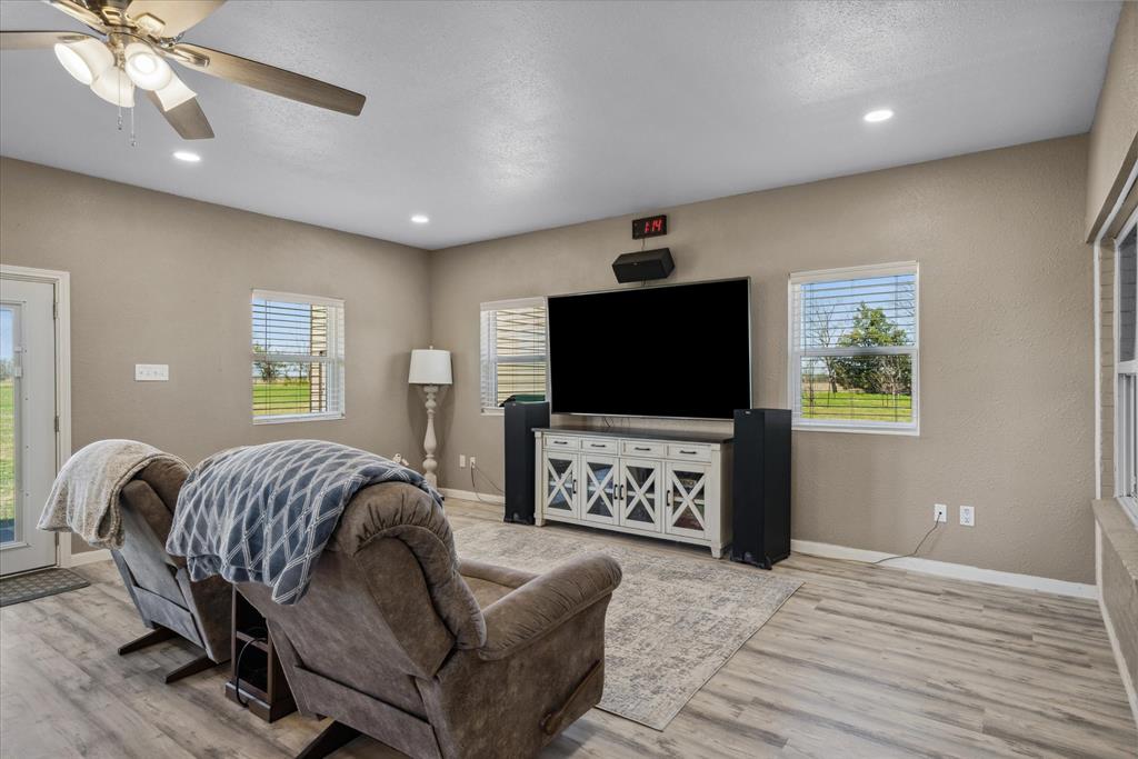 16159 County Road 347 Wills Point, TX 75169 - Photo 13 of 38 a living room with furniture and a flat screen tv