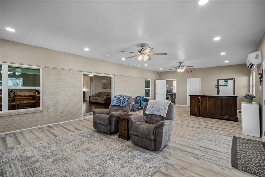 16159 County Road 347 Wills Point, TX 75169 - Photo 14 of 38 a living room with furniture and a chandelier