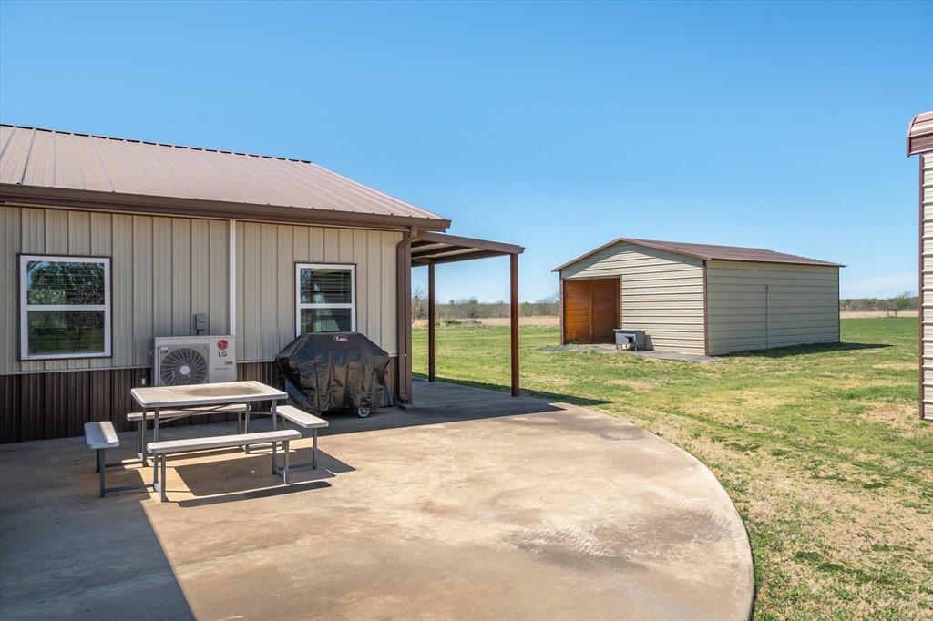 16159 County Road 347 Wills Point, TX 75169 - Photo 36 of 38 a front view of a house with a garden