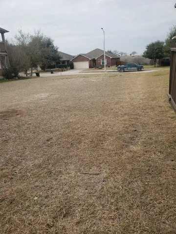 a view of outdoor space and yard