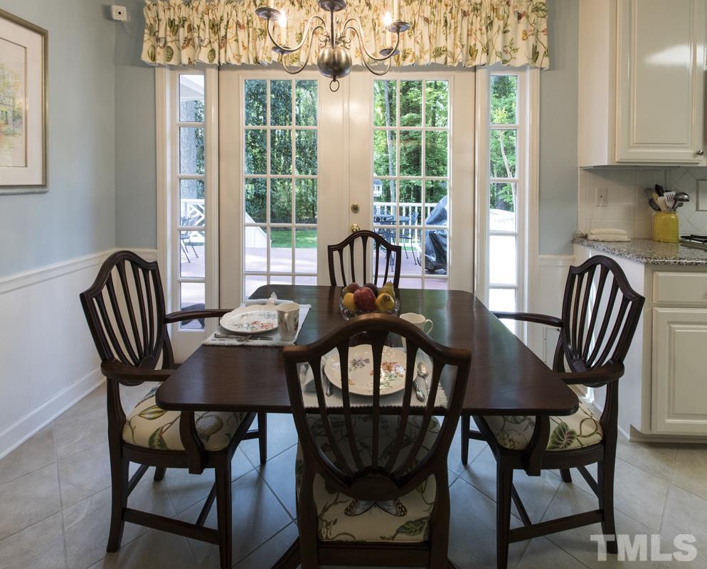 4032 Nottaway Road Durham, NC 27707 - Photo 14 of 25 A breakfast area in the kitchen overlooks the backyard and provides a lovely way to start the day!