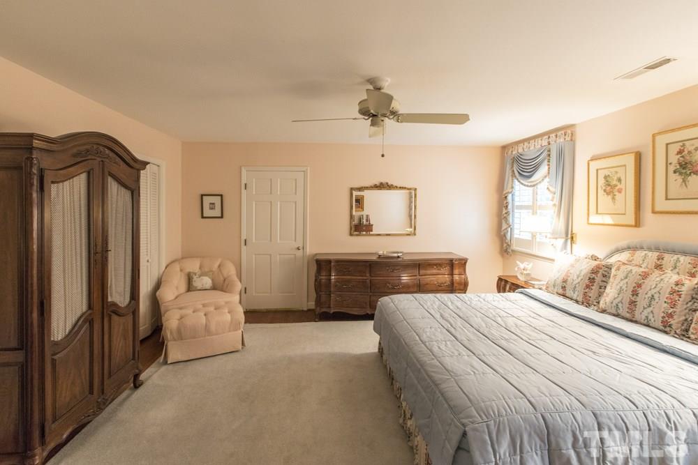 4032 Nottaway Road Durham, NC 27707 - Photo 18 of 25 A spacious bedroom on the second floor serves as the master with a large walk-in closet (formerly a nursery) that could be transformed to a master bath.