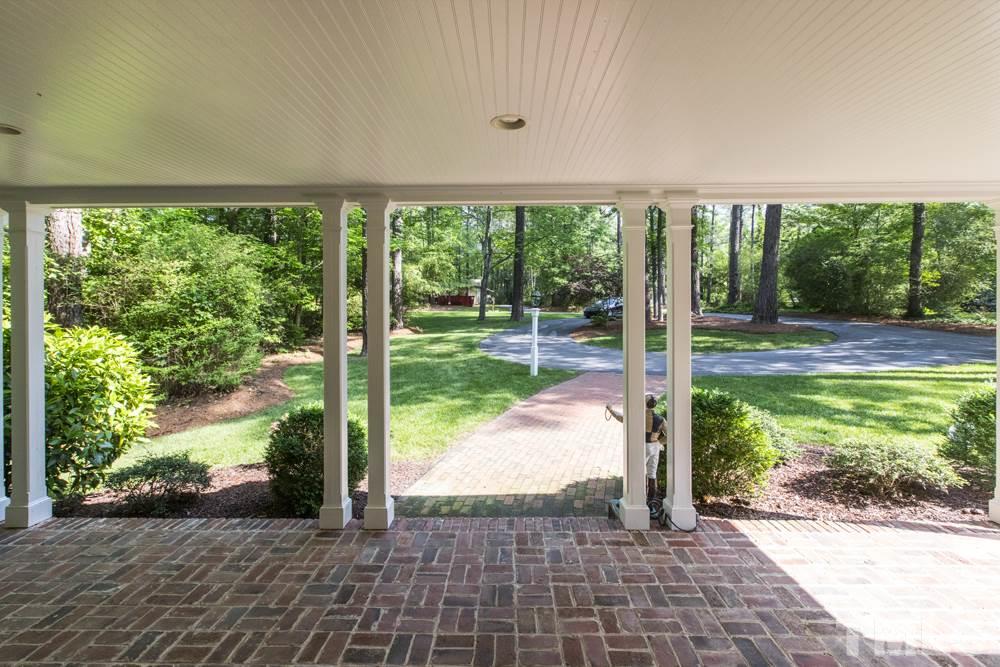 4032 Nottaway Road Durham, NC 27707 - Photo 23 of 25 A spacious brick-paved front porch is a great spot for watchin the world go by.