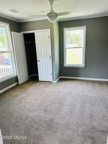 an empty room with windows